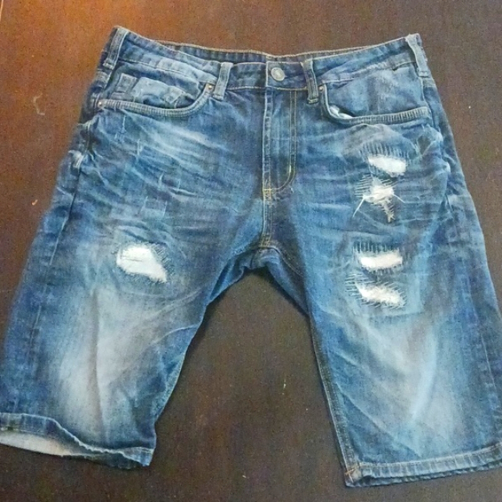 Distressed blue shorts